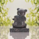Lápida infantil con oso de peluche y estrella