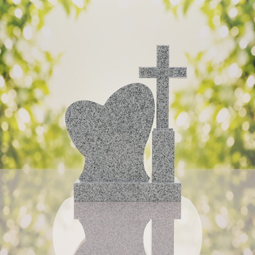 Monumento conmemorativo con corazón y cruz