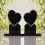 Lápida doble con dos corazones