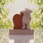 Lápida infantil con oso y corazón