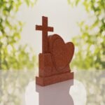 Monumento conmemorativo con corazón y cruz