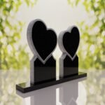 Lápida doble con dos corazones